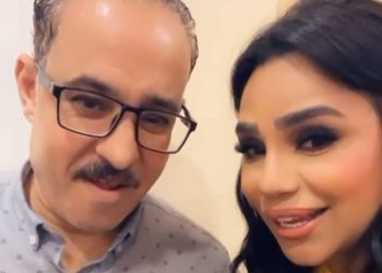 أمينة وسيكا أحد أفراد فرقتها الموسيقية